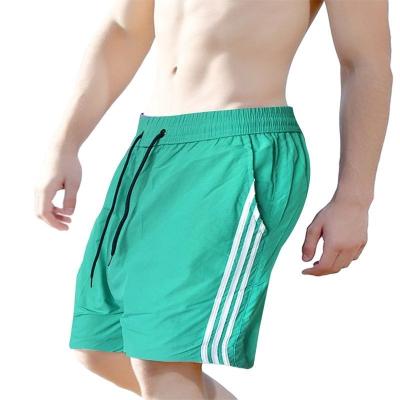 China Custom Made Polyester Mens Breathable Sublimation Beach Shorts Loose Shorts For Mens Summer Wear for sale