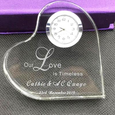 China Europe Personalized Crystal Gifts Crystal Heart Shape Clock For Wedding Gift for sale