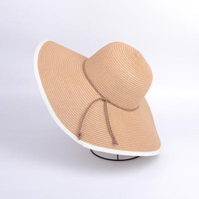 China Character Women Wide Brim Beach Hat Bowknot Summer Sun Foldable Straw Hat for sale