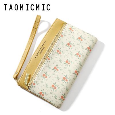 China TAOMICMIC raincoat ready to ship fashion women large capacity and long PU flower pattern logo waterproof leather female customized wallet for sale