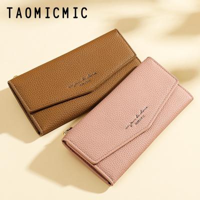 China Retro Taomicmic waterproof multi-card position folding long Korean fashion women's simple three-fold clip along wallet for sale