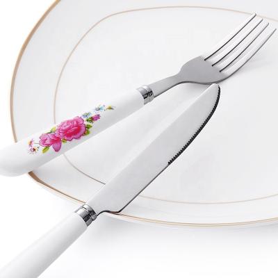 China Viable Handle Stainless Steel Dinnerware Set Fork Knife Spoon Plastic Printed Cutlery Set For Super Markets Restaurants for sale