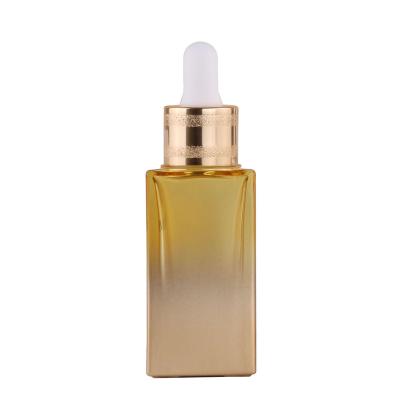 China Wholesale Personal Care Recyclable Large Golden Yellow Rectangle Glass Dropper Bottle 30ml Square Perfume Oils Serum Bottles With Top Drop for sale