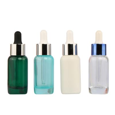 China Free Sample 20ml Personal Care Frost Green White Glass Essential Oil Dropper Bottles Recycled Cosmetic Packaging With Dropper Lid for sale