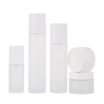 China 30 40 100ml 120ml Cosmetic Mask Bottle 30 40 100ml 120ml Cosmetic Cream Jar Pump Lotion Pump Lotion White Glass Bottle for sale