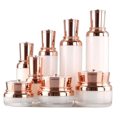 China Wholesale Cosmetics Luxury Cosmetics Fine Mist Bottle White Rose Acrylic Gold 30ml 50ml Lotion Plastic Spray Bottle for sale