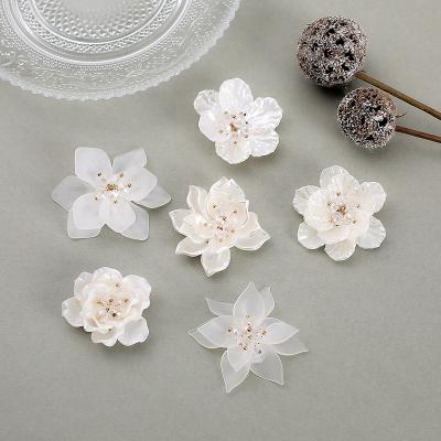 China Yiwu Large OEM Environmental Friendly Professional Manufacturing Fashion White Flower Handmade Jewelry Accessory for sale