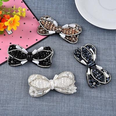 China Environmental Friendly Crystal Rhinestone Jewelry Accessory For Fashion Bow Rhinestone Beaded Hair Clips for sale