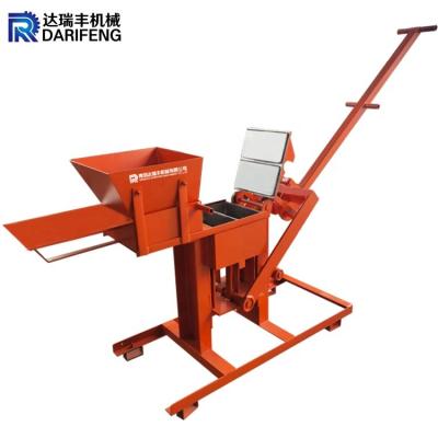 China Qmr2-40 brick machine making manual interlocking brick machine to earn money at home for sale