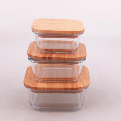 China Microwavable square glass food container set with bamboo lid for fresh fruit and vegetable for sale