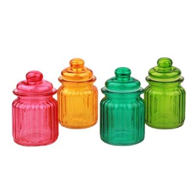 China Modern Colorful Airtight Glass Spice Jar With Lid Candy Storage Container Glass Jar for sale