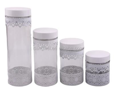 China Sustainable Popular White Metal Wrapped Cheap Glass Jar Storage Glass Jar for sale