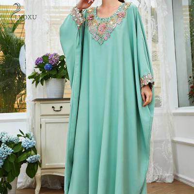 China Green Long Sleeve Solid Color Polyester Pink Muslim Abaya Dress Casual Loose V-neck Islamic Clothing for sale