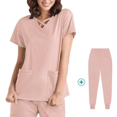 China Eco-friendly Wholesale Medical Nursing Women Scrubs Uniforms 4 Way Stretch Hospital Uniform Sets With Pocket for sale