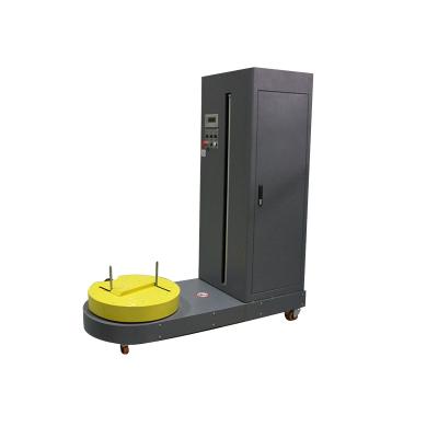 China Reliable Beverage Performance Airport Luggage Automatic Luggage Winding Machine for sale