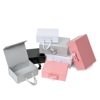 China Luxury Magnetic Folding Paper Gift Box Christmas Storage Gift Biodegradable Custom Packaging Box With Ribbon for sale