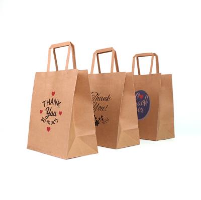 China Takeaway Shopping Recyclable Gift Kraft Paper Bag Packaging Clothing Thank You Party Gift Bag With Handle for sale