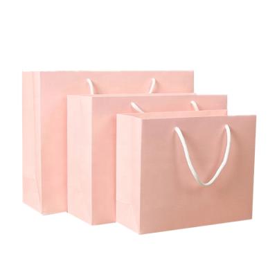 China Recyclable Customized Fashion Art Paper 250gsm A3 Size Pink Paper Bags With Handles for sale