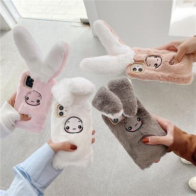 China Unique New Design Fuzzy Move The Rabbit Ears Cute Furry Cell Phone Case For Iphone 11 12 For Huawei for sale