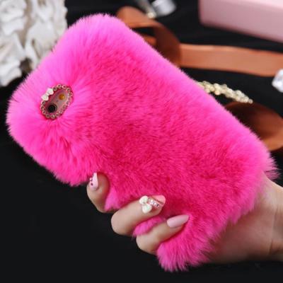 China Soft Warm Fluffy Cute Fur Fluffy Phone Cases For Iphone 11 Pro Max Girls Shockproof Bumper Kickstand Cover for sale