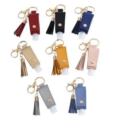 China Travel 30Ml PU Tassels Bottle Hand Carriers Eco-Friendly Portable Empty Leakproof Plastic Leather Holder Travel Key Chain for sale