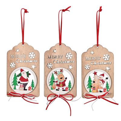 China 2021 Merry Christmas Modern Wooden Hanging Ornaments Small Wooden Ornament with Santa Snowflake Patterns for sale