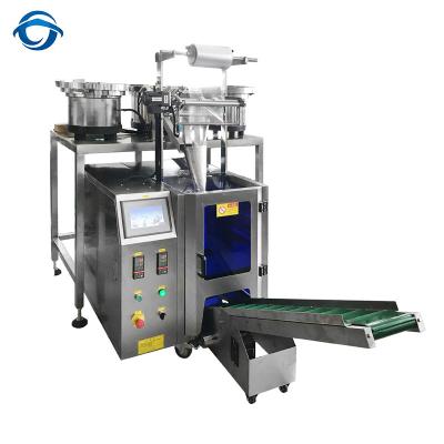 China Automatic CLOTHING Tubes And Nuggets Counting Packing Machine for sale