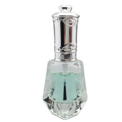 China Wholesale Fashion 8ml Cosmetic Empty Shaped Clear Nail Polish Glass Bottle With Fancy Custom Silver Cap And Brush for sale