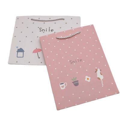 China Good Style Recyclable Pink Cute Portable Shopping Paper Bag Thickened Large Capacity Portable Paper Bag for sale