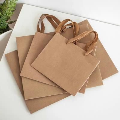 China Recyclable Professional Kraft Paper Shopping Bag Security Kraft Maker Portable Paper Bag for sale