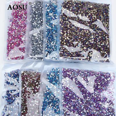 China Hot Sale Flatback AOSU ss3 Package Bulk Sky Clear Color Crystals 4 6 10 12 20 30 40 50 Flat Back Glass Rhinestones For Garment for sale