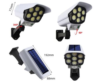 Chine Simulation du capteur 77 LED de porte surveillant la sécurité allumant la lampe de mur solaire de caméra de simulation de capteur de mouvement solaire à vendre