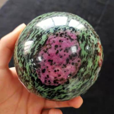 China Wholesale Natural Polished Crystal Ball Red Healing Quartz China Zoisite Crystal Spheres For Decoration for sale