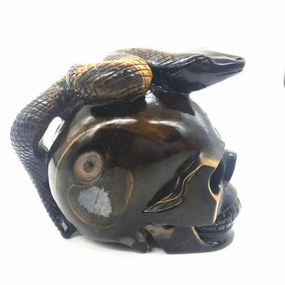 China China Natural Tiger Eye Human Skulls With Crystal Stones High Quality Healing Snake Skulls Crystals For Home Decor for sale