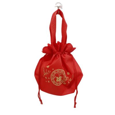 China Custom Drawstring Handle Personalized Chinese Custom Logo Printed Drawstring Non Woven Cosmetic Packaging Bag for sale