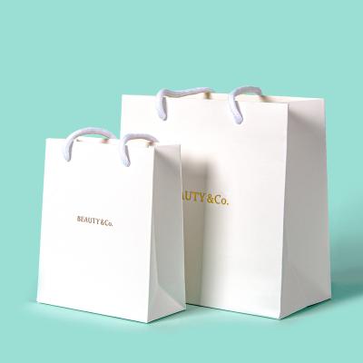 China Recyclable Custom Logo Luxury Craft Kraft White Printing Paper Bags With Handles for sale