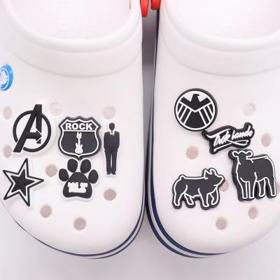 China Wholesale Soft Customize Pattern Black And White Designer DIY PVC Shoe Charm Croc Charms Shoe Decorations Kids Gift for sale