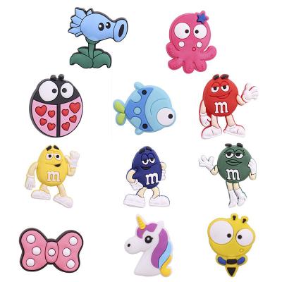 China Wholesale Softly 10 Pcs+ Customize PVC Shoe Charm Millimeter Chocolate Bow Cartoon Charms Designer Charms Shoe Decorations for sale