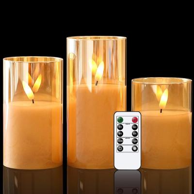 China Hot Selling Birthdays 3D Flame Movable Pillar Decoration 4 Home Timer 8 Hours Gold Glass Flameless Led Candle With Remote for sale