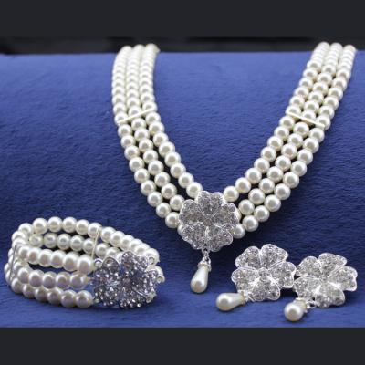 China Hyperbole Factory Wholesale Cheap Price Gorgeous Pearl Five Piece Set Lawn Wedding Jewelry Set for sale