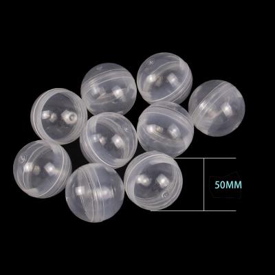 China Pack of small toys inside 50mm clear containers pp material round surprise capsules for Gumball machines and gift for sale