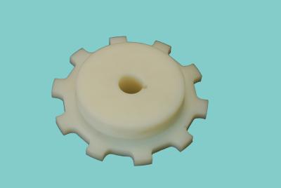 China 1701/1701TAB  MACHINED CHAIN SPROCKETS MOULDED CONVEYOR WHEELS IDLERS WHITE AND BLACK COLOR for sale