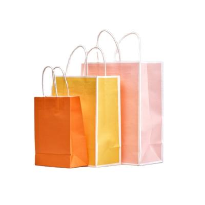 China High Quality Materials Fashion Recycled Logo Printed Kraft Paper Gift Custom Packaging Bags for sale