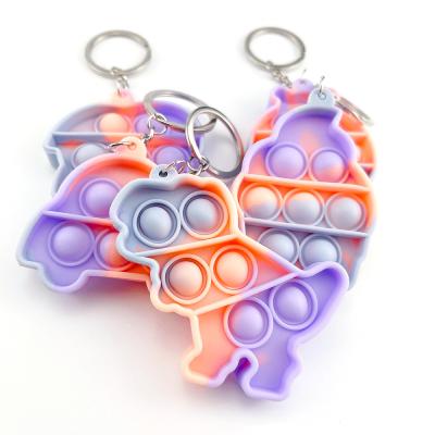 China Worry Relife Toy Three-color Macarone Key Chain Toy Silicone Stress Toy Funny Sensory Toy for sale