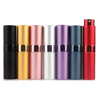 China Personal Care Round 8ml 10ml 15ml 20ml 30ml Twist Up Portable Metal Spray Bottle Refillable Aluminum Perfume Atomizer for sale