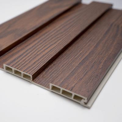 China Modern Wood Grain PVC Wpc Wall Panels Designs For Hot Sale 3D Interior Wall Cladding Interior Decoration Decorative Panels for sale