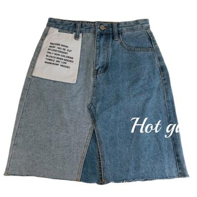 China New Breathable Mini Denim Skirt Women Damage Big Denim Shorts Skirts Buttons Pockets Denim Skirts For Women for sale