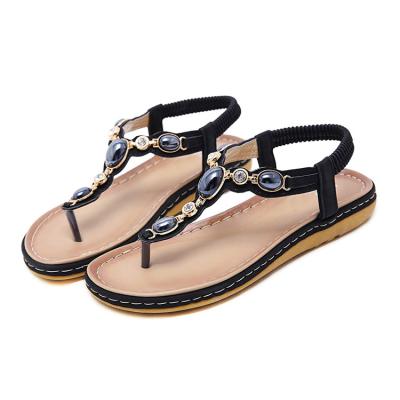 China Fashion New Women's Price Stylish Ankle Strap Sandals Lightweight Roman T-strap Cheap Casual Roman Flat Sandals For Ladies for sale