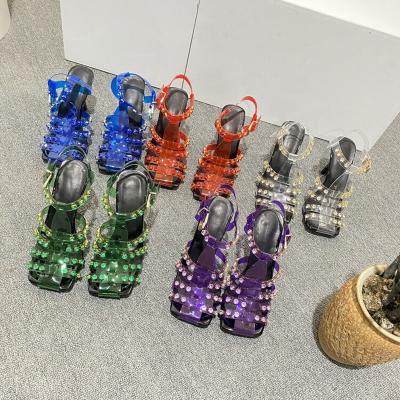 China 2022 New Trend Fashion Summer Roman Style High Heels PVC Sandals Catwalk Rivet Women Shoes for sale