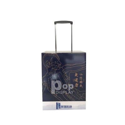 China Customized Recyclable corrugated cardboard draw-bar box trolley case spot color POS display trade show paper display with heels for sale